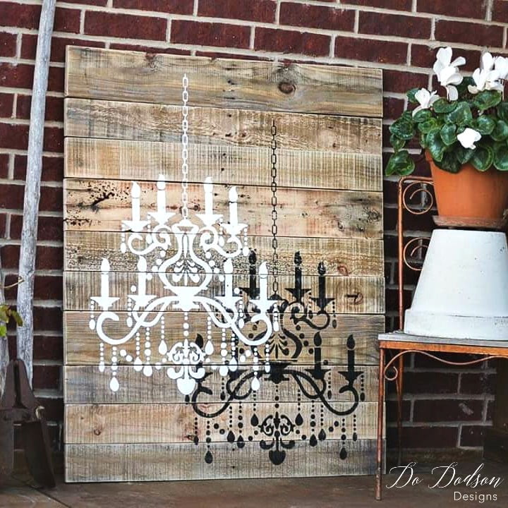 Just one wood pallet and a great stencil is all you will need to create this beautiful chandelier wall art. 