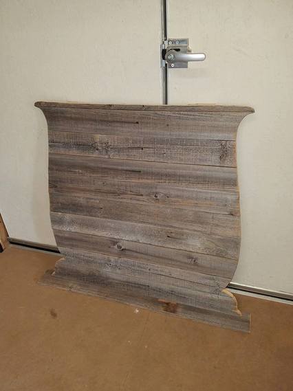 Repurposed fence boards for a custom back on an antique washstand.