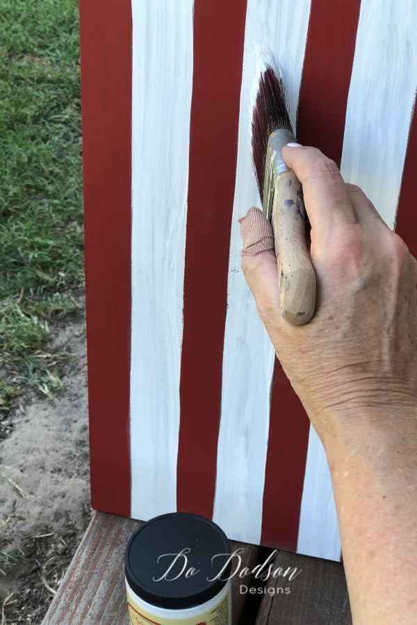 Red, white and blue on an DIY wooden American Flag sign. 