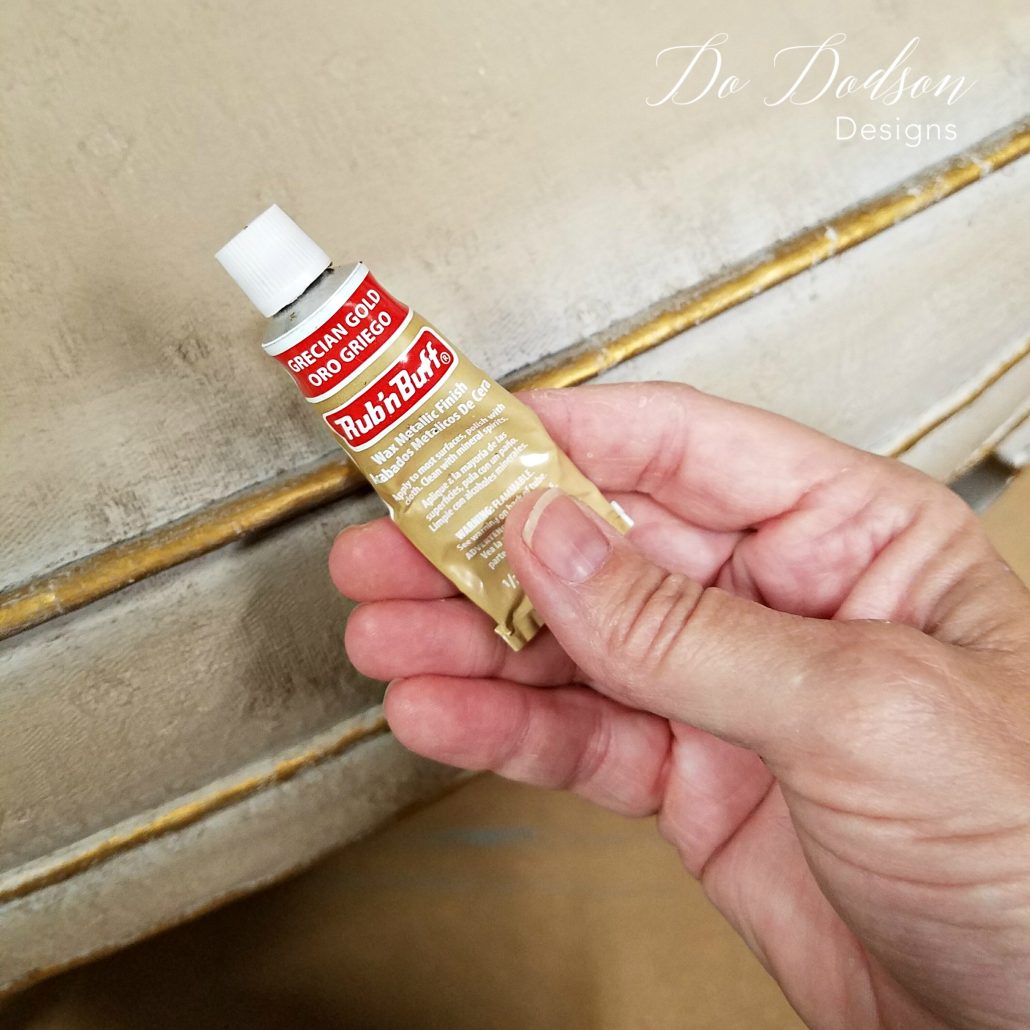 Gilding wax can add beauty and detail to you painted fabric. Yes, you can paint fabric on old chairs. #dododsondesigns #paintfabric #paintedfabric #fabricpaint #paintedfurniture