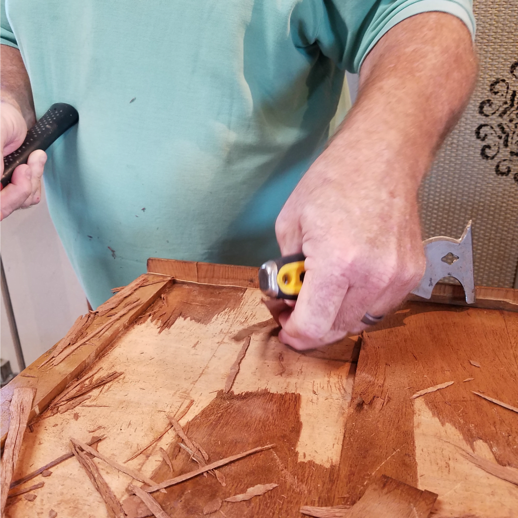 Dealing with veneer damage can be tricky, but very doable. Removing veneer from a wood dresser. #dododsondesigns #veneerdamage #veneerremoval