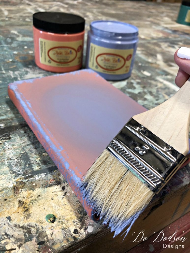 With a chip brush I added a contrasting chalk paint color to the corners of the painted book for a vintage look. 