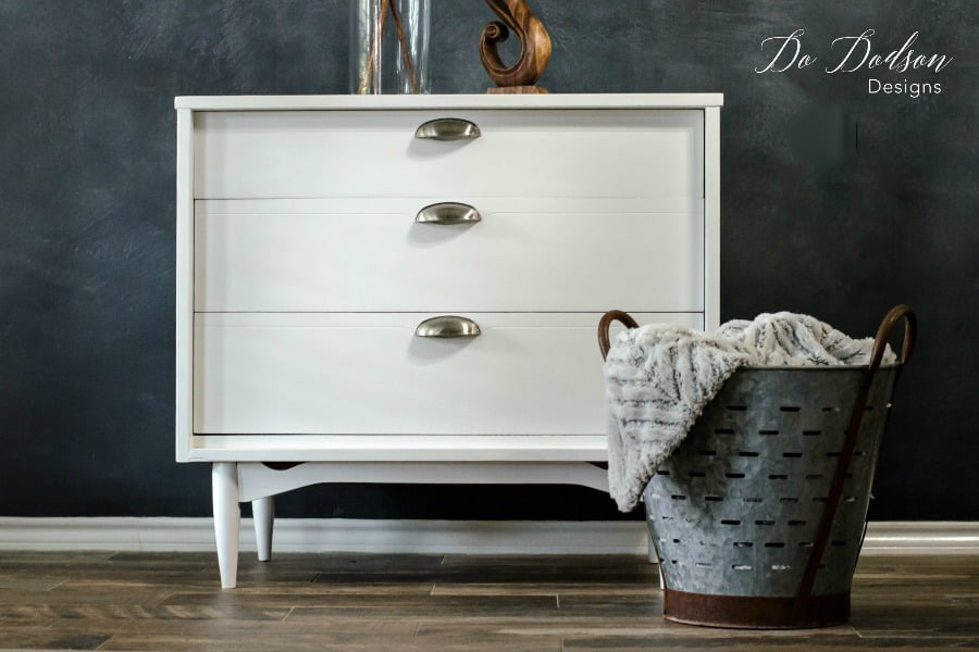 Using white paint on this mid century modern piece added a clean look. Consider a neutral color for your next furniture painting project.