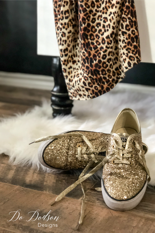 Create staging is a must when staging a headboard bench. These gold glitter shoes are perfect!