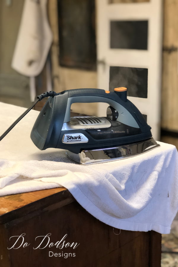 How to remove veneer with a steam iron and wet towel. 