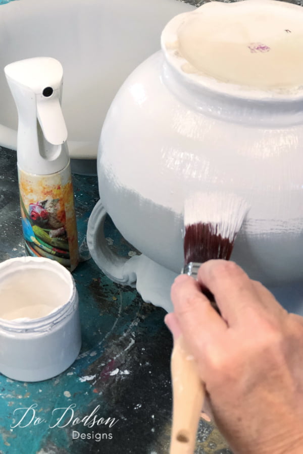 How to create a modern design on a painted ceramic pitcher.