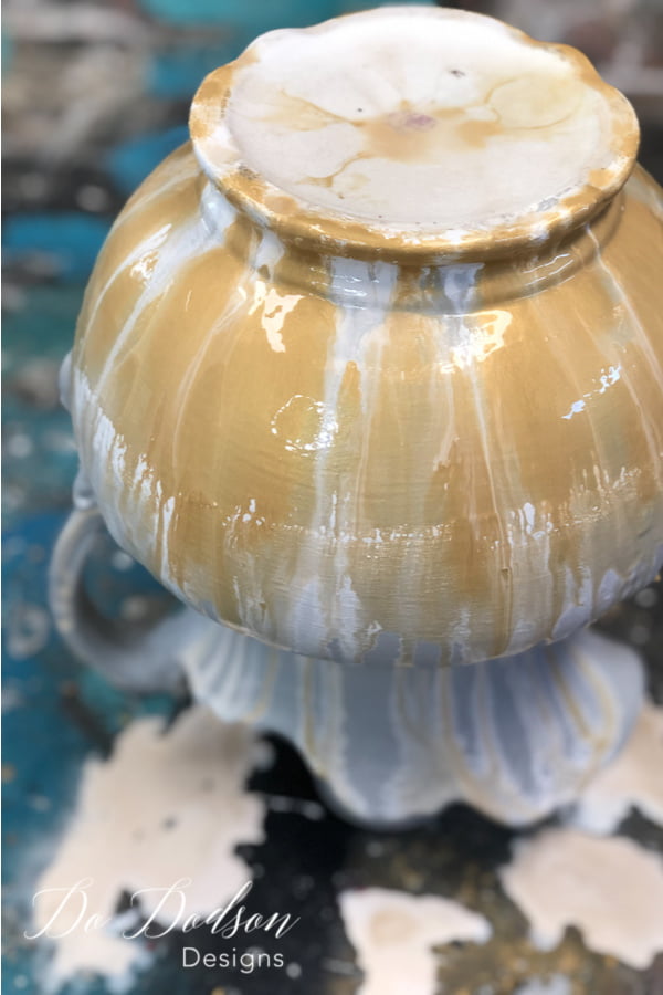 I used a metallic gold paint to create this look on this painted ceramic pitcher.