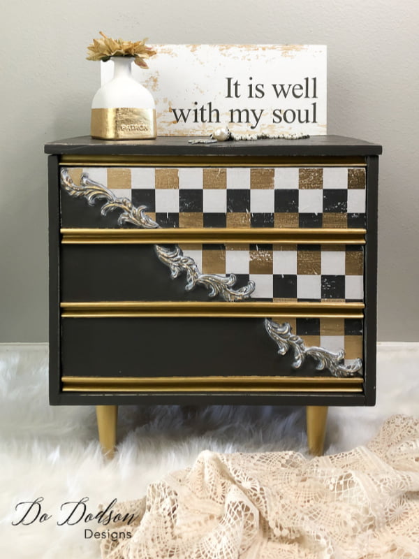 The combination of gold, gray and white checkered paper on this whisical furniture makeover is over the top amazing!