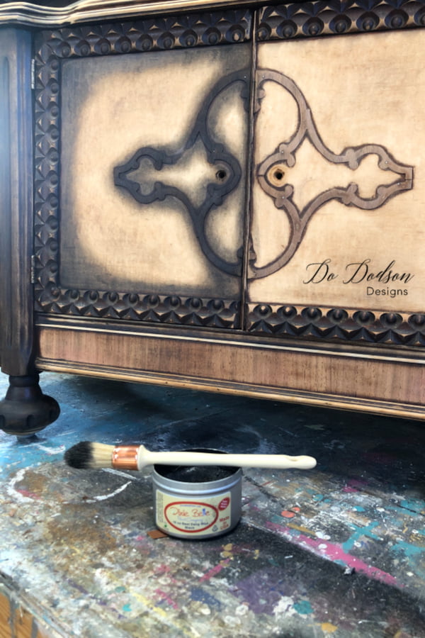 Adding black wax to this old piece of furniture will bring back the beauty of the wood. 
