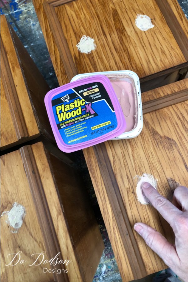 Apply the wood filler with your finger and force the filler into the holes. Make sure it fills it completely and comes out on the other side of the hole and a little above the surface.