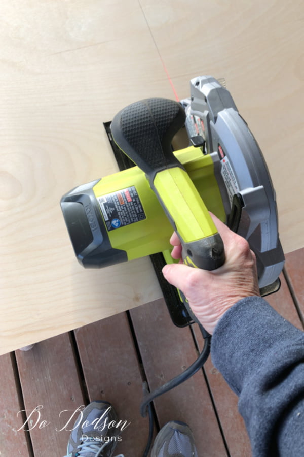 Now for the cut! I like to use a circular saw with a laser guide. I don't have a large table saw so this works for me. A steady hand is also a great tool when you're adding shelves to a dresser.