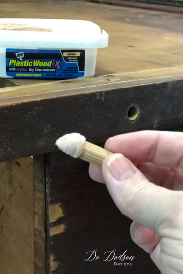 Insert the wooden dowels into the holes and countersink them just enough so that you can add wood filler to cover the holes.