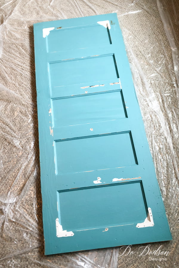 This old door is getting a makeover with the addition of hairpin legs. It's going to make the perfect DIY desk.