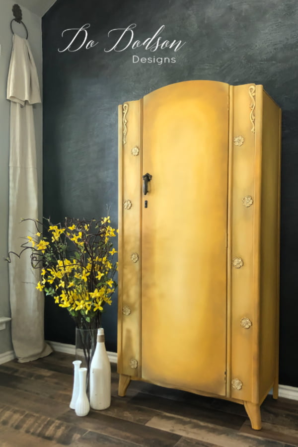 I love the way blending chalk paint on furniture with water creates a cohesive look with colors. This yellow armoire looks amazing!