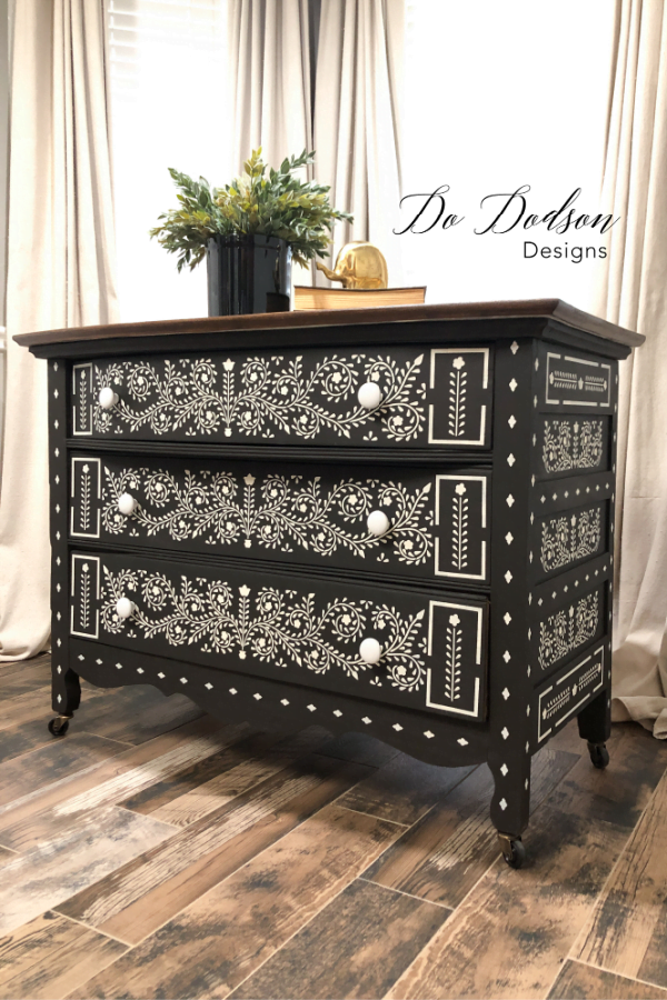 This DIY Bone inlay dresser is stunning painted in black and white. It blends well with my neutral decor. 