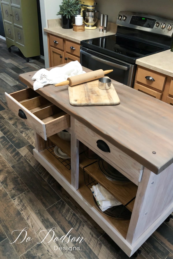 Small kitchen do create a problem when it comes to counter space. I made this DIY rolling kitchen island out of an old cabinet. It was the perfect solution. 