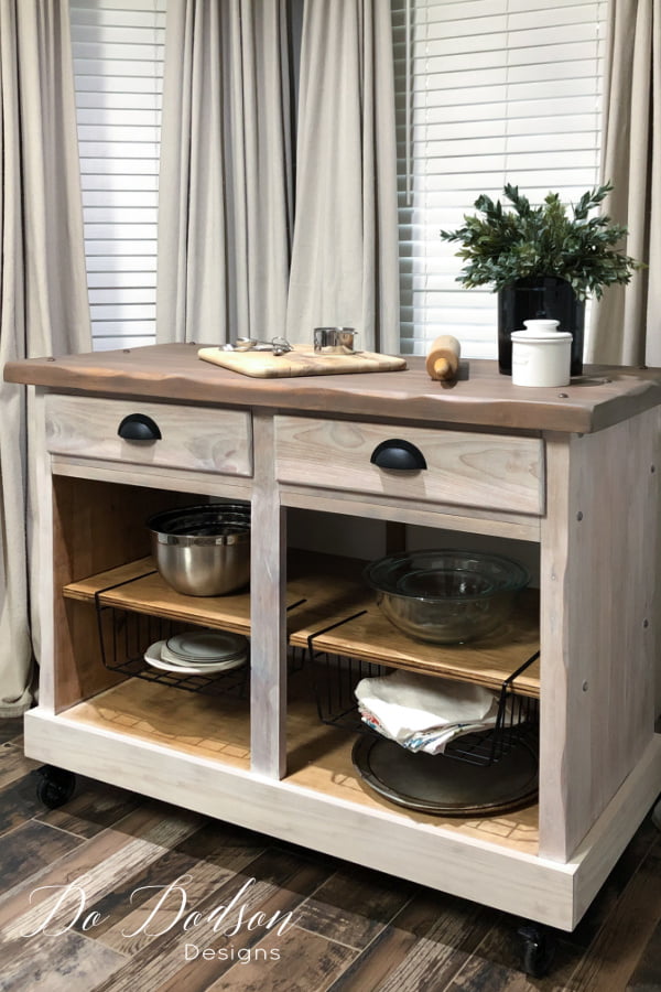 You would never know that this was an old cabinet. It had seen better days for sure! Now it's a rolling kitchen island that is used daily in my small kitchen.  Learn how to DIY one like his on the blog. 