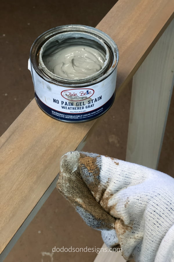 I layer gel stain in different colors on wood for a rust weathered finish. 