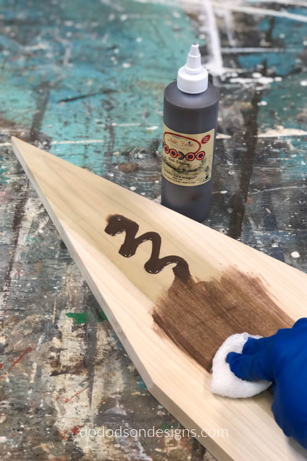 I stained the board using a water-based stain before painting it. 