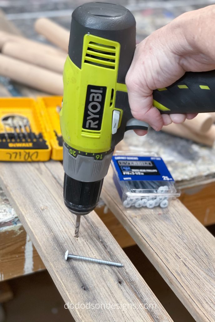 Predrill the holes in the rails using a drill bit just a size bigger than the wood screw. You'll want it to slide through the hole but be snug. This will eliminate cracks and splintering of the wood when it's drilled into place on your blanket ladder.