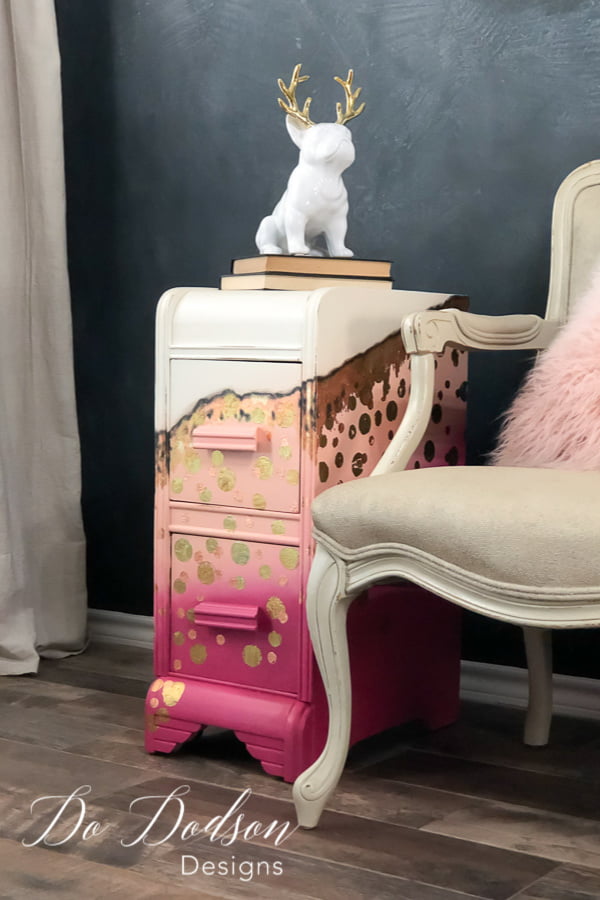 For the little girl inside me that screams to get out every once in a while... I created this bold whimsical look on this repurposed vanity turned side table using chalk paint colors in Peony, Apricot and Butter Cream. Of course I had to add a touch of gold leaf. 