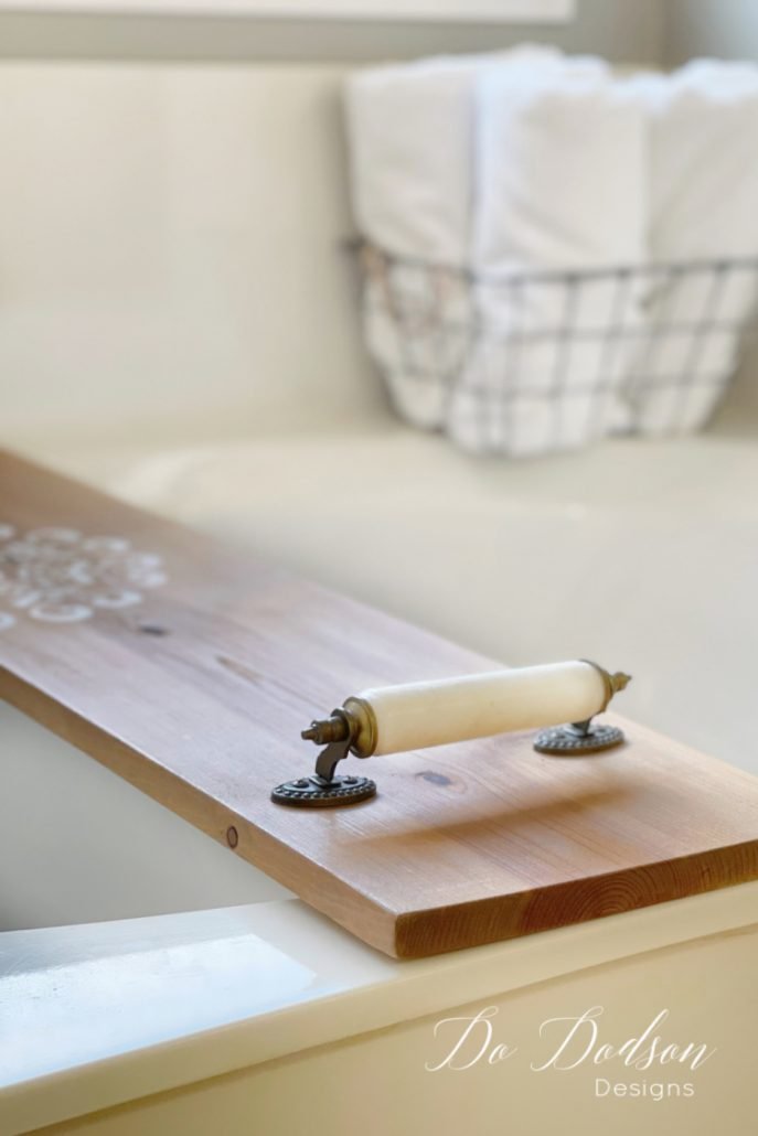 Try this 1 board bathtub caddy... it was the easiest project ever! Add some cute Hobby Lobby handles, and you have money in your pocket. $$$ 