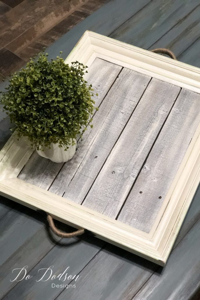 Got wood scraps?! Make this easy DIY picture frame tray. The thrift store and Goodwill are full of these old frames, and they're perfect for this unique coffee table tray. Cha-ching! $$$