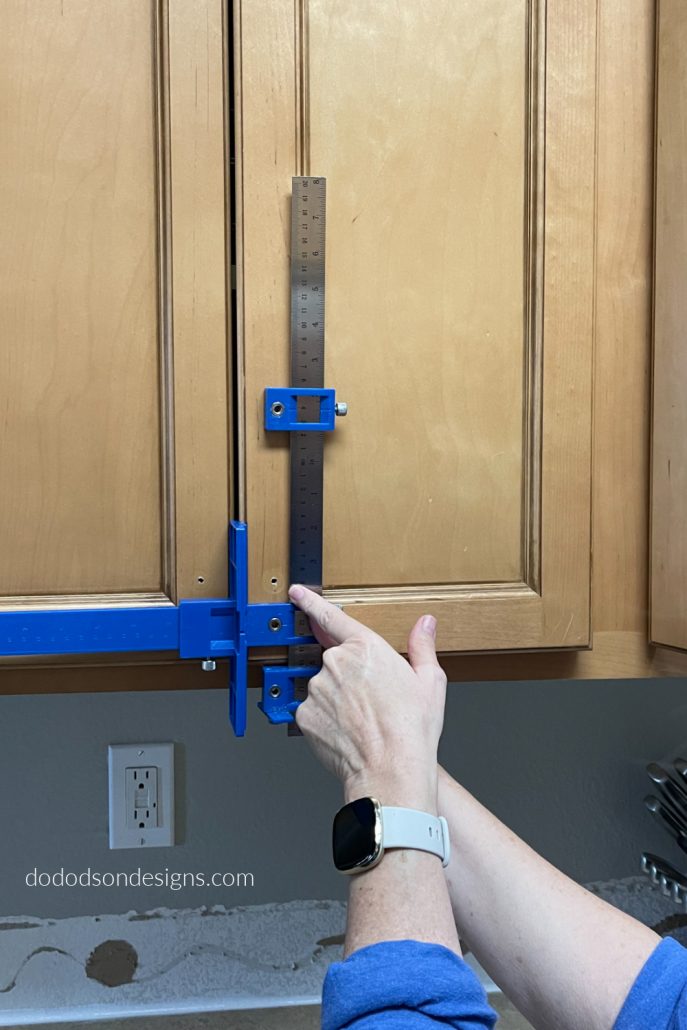 Try this cool tool when updating your kitchen cabinet hardware. It so easy to get the perfect holes so your hardware has perfect alignment. 