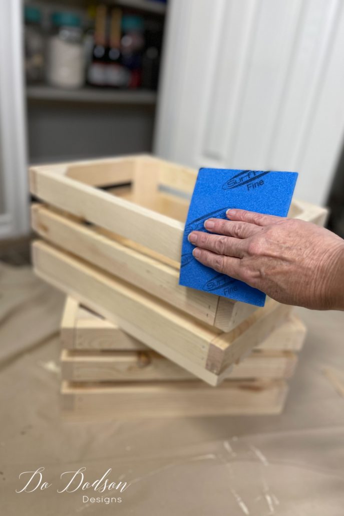 These wood crates are super sturdy and also a bit rough. It's a good idea to sand them with a 220 grit sanding pad before you finish them out and using them for storage in your pantry.