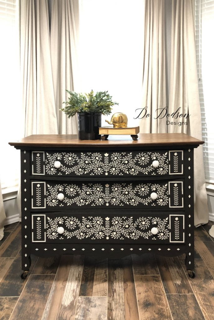 Here we have one of my favorite black-painted inspired pieces of furniture. This loveliness of stenciled art gives this dresser some real character. Learn how I did it on the blog. 