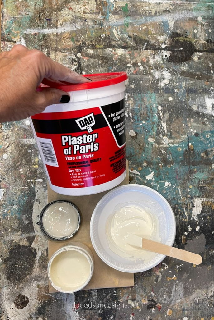 Mix one part plaster to one part paint to make a paste/icing that you can decorate your wood block Christmas trees with. 