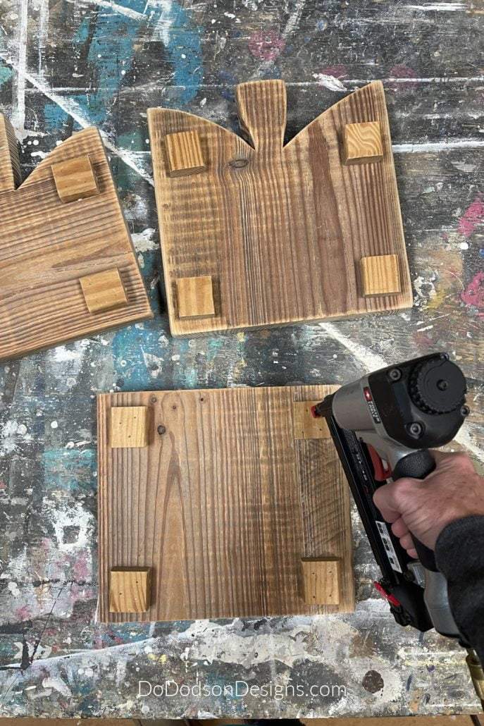 To attach the legs to the wood DIY table risers, You can use whatever method will make them adhere. You can choose to glue them on. There is no shame in that. Good wood glue will do the trick. 